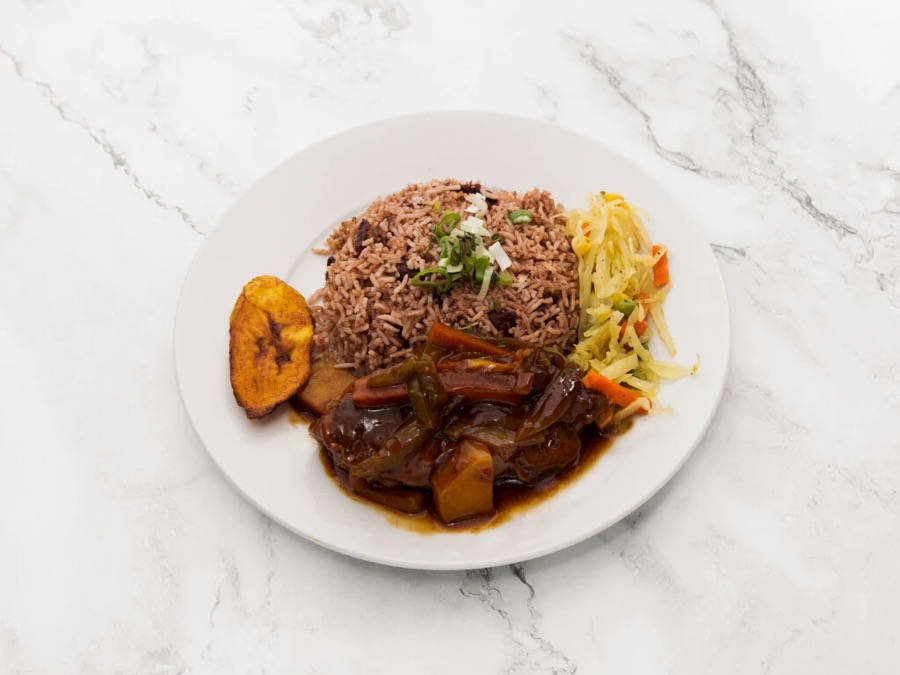 Jamaican jerk chicken with rice and peas